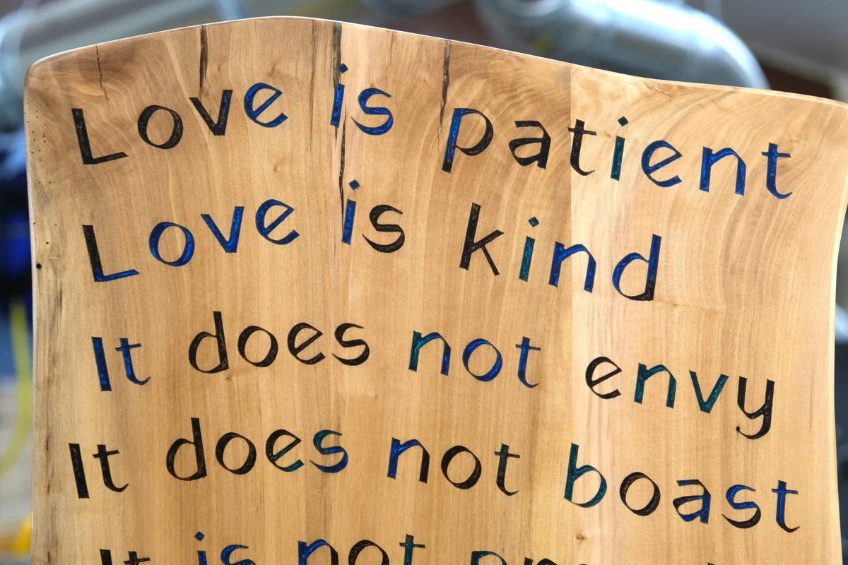 Love Never Fails Wooden Sign with Epoxy Inlay
